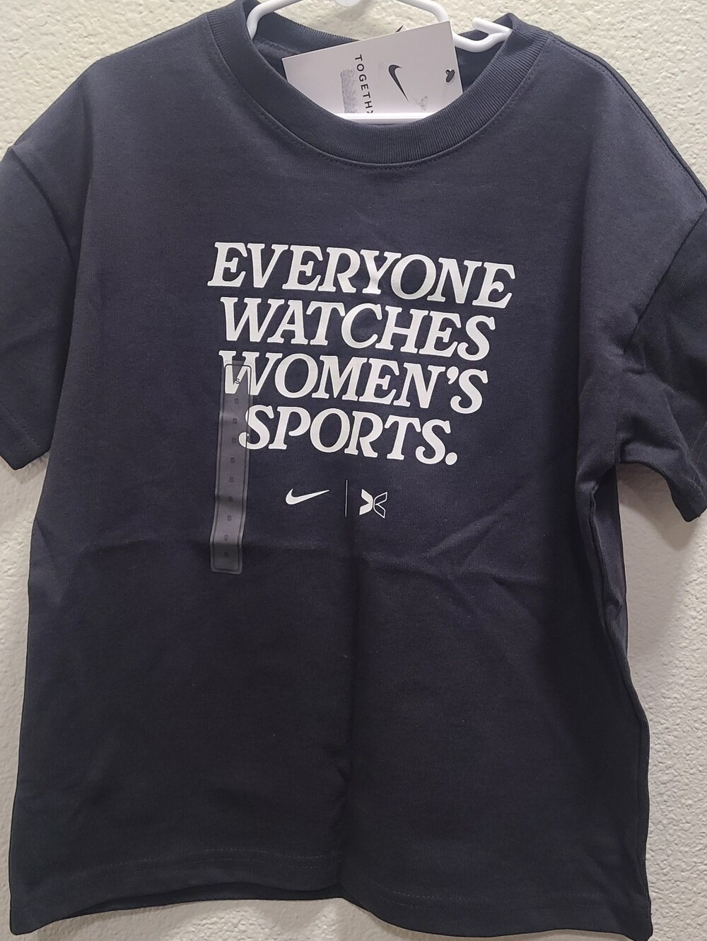 Nike Women’s Navy Graphic Tee - "Everyone Watches Women's Sports."